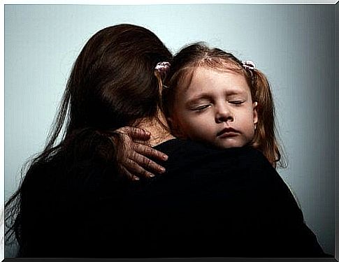 mother and daughter hugging each other with emotion