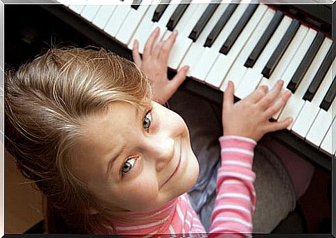 girl playing piano