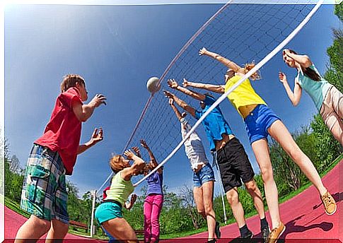 children playing volleyball