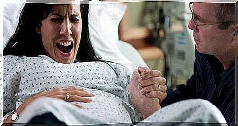 Woman giving birth, facing the fear of childbirth